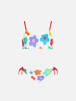 Bikini da bambina a bralette con stampa margherite multicolore