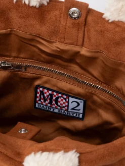Borsa piccola morbida in pelle di montone color cammello con logo Saint Barth e tracolla