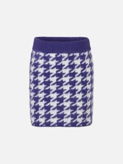 Gonna da bambina in maglia con bottoni gioiello