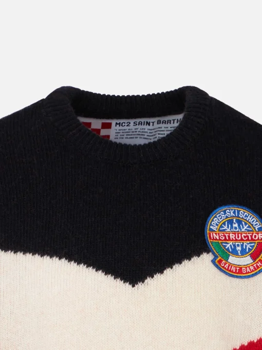 Maglia da bambino rossa e blu con patch
