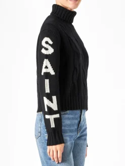 Maglia da donna a collo alto nera intrecciata