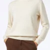 Maglione dolcevita bianco lavorato a maglia da donna