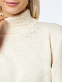 Maglione dolcevita bianco lavorato a maglia da donna