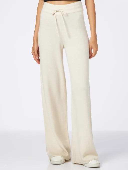 Pantaloni a palazzo in maglia bianca