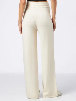 Pantaloni a palazzo in maglia bianca