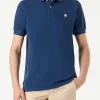 Polo in denim piquet blu con logo St. Barth