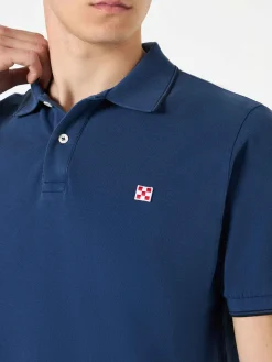 Polo in denim piquet blu con logo St. Barth