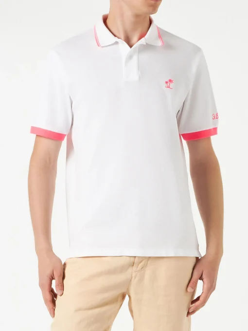 Polo in piquet bianco con ricamo palme
