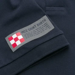 Polo piquet blu con logo St. Barth check