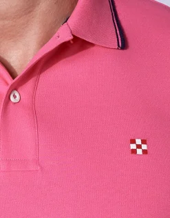 Polo piquet rosa fluo con logo St. Barth check